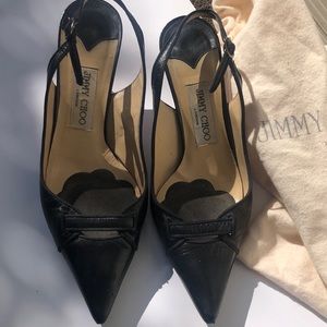 Black leather Jimmy Choos—two different sizes. Left: 37.5 Right 39